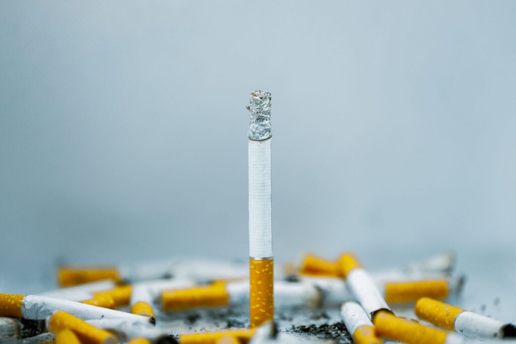 Broken cigarettes on a table, representing the decision to stop smoking